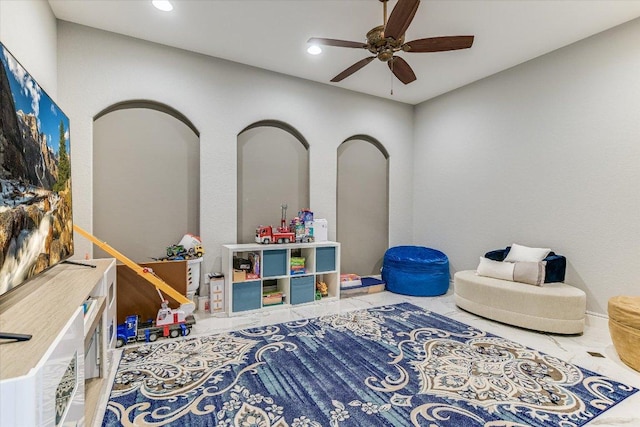 playroom featuring a ceiling fan and recessed lighting