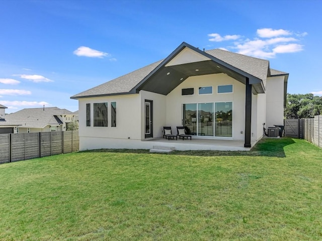 rear view of property featuring cooling unit, a patio area, a lawn, and a fenced backyard