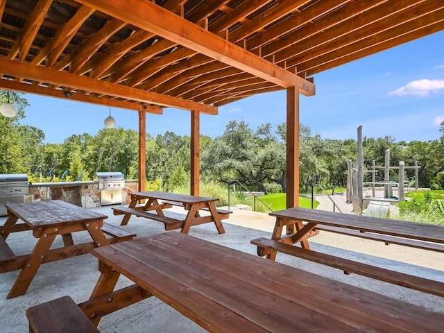 view of patio / terrace with exterior kitchen and grilling area