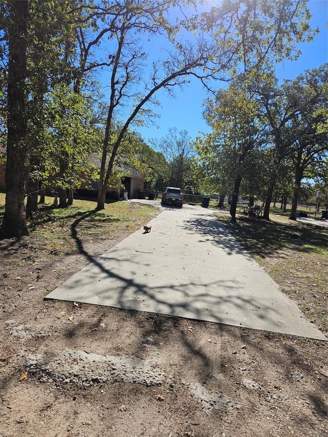 view of road featuring driveway