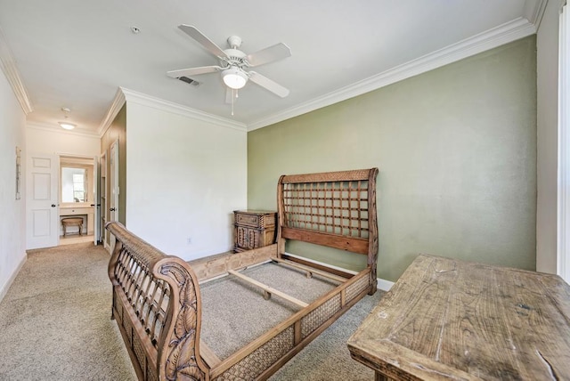 carpeted bedroom featuring visible vents, crown molding, baseboards, and ceiling fan