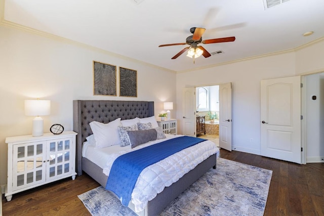 bedroom with baseboards, visible vents, ensuite bath, ornamental molding, and wood finished floors