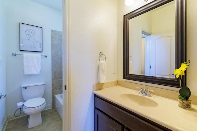 bathroom featuring toilet, tile patterned floors, and vanity