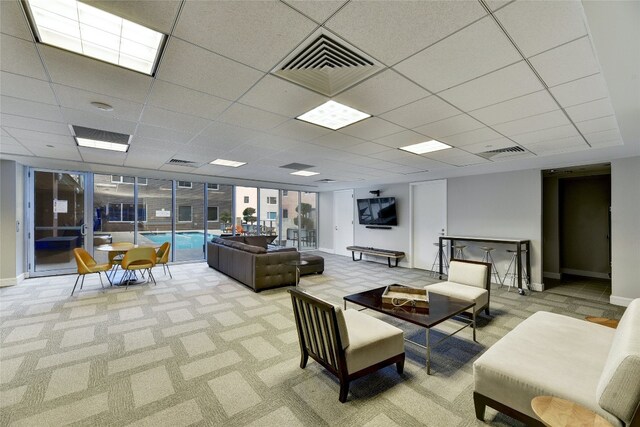 901 W 9th St Unit 1002, Austin, TX 78703 - living room with carpet flooring and a paneled ceiling