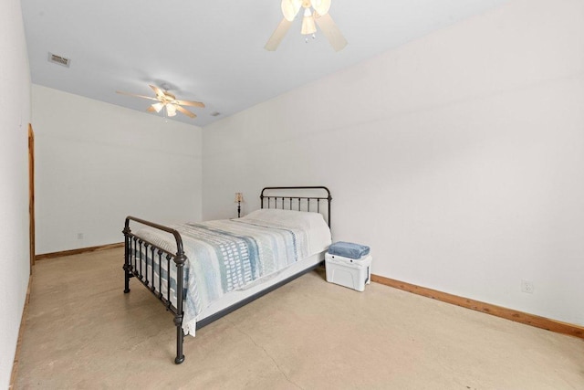 bedroom featuring baseboards, finished concrete floors, visible vents, and ceiling fan