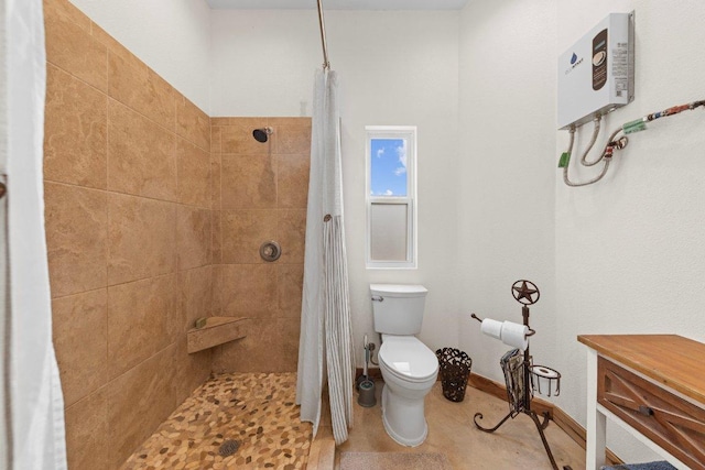 full bathroom with water heater, tiled shower, toilet, and baseboards