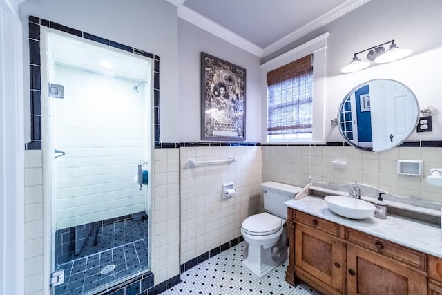 full bath featuring crown molding, toilet, a stall shower, vanity, and tile patterned flooring