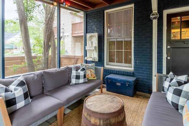 sunroom featuring plenty of natural light