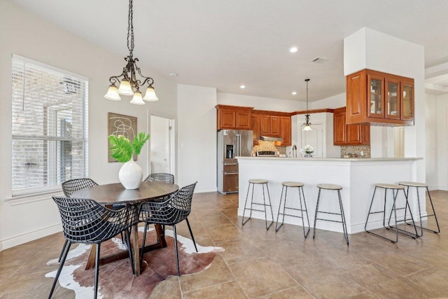 dining area featuring an inviting chandelier, recessed lighting, visible vents, and baseboards