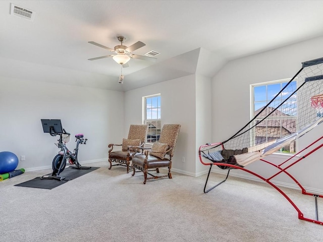 exercise room featuring carpet, visible vents, ceiling fan, and baseboards