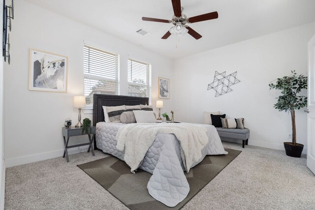 1409 Kneehigh Ln, Georgetown, TX 78633 - carpeted bedroom featuring baseboards and ceiling fan