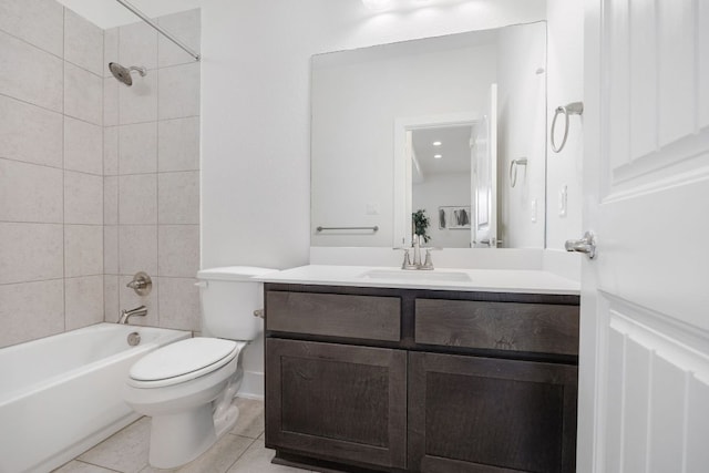 full bath featuring toilet, bathing tub / shower combination, vanity, and tile patterned floors