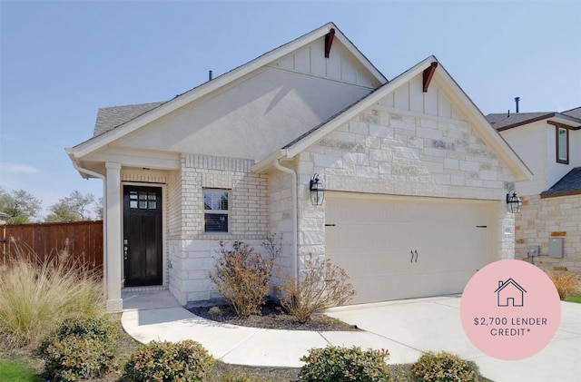 1409 Kneehigh Ln, Georgetown, TX 78633 - view of front of home with stone siding, board and batten siding, an attached garage, and driveway