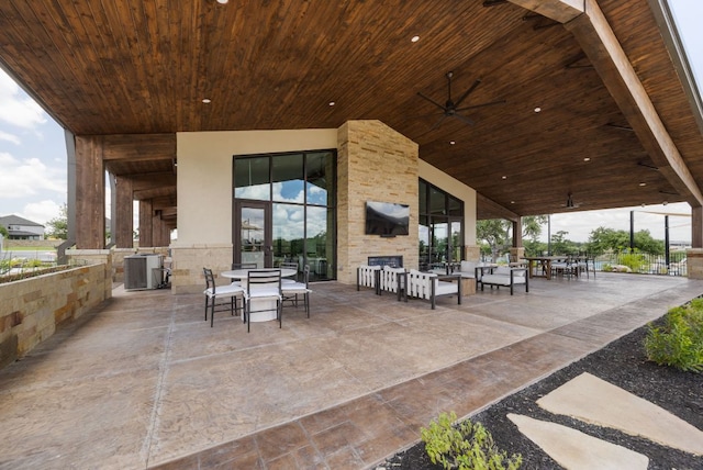 1409 Kneehigh Ln, Georgetown, TX 78633 - view of patio featuring outdoor dining area and ceiling fan