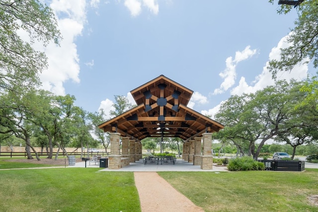 1409 Kneehigh Ln, Georgetown, TX 78633 - surrounding community featuring a yard, a gazebo, and a patio
