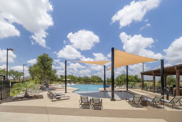 1409 Kneehigh Ln, Georgetown, TX 78633 - community pool featuring a patio