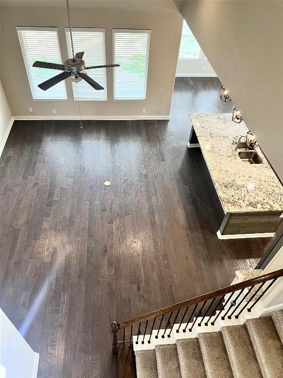 13825 Chester Knl, San Antonio, TX 78253 - interior space featuring a ceiling fan, baseboards, and wood finished floors