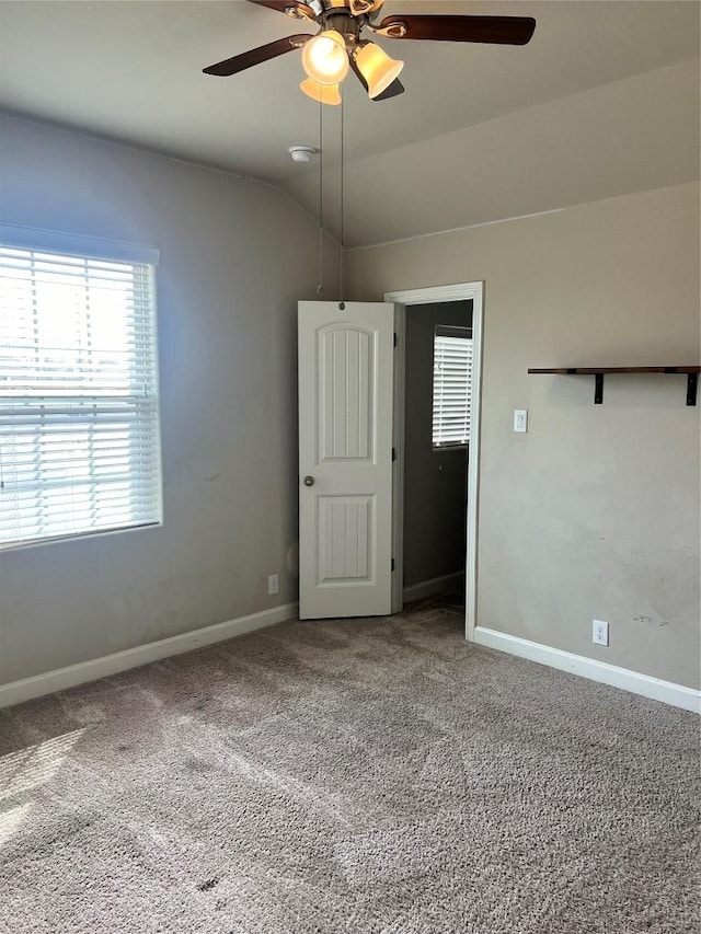 13825 Chester Knl, San Antonio, TX 78253 - empty room featuring carpet, ceiling fan, lofted ceiling, and baseboards