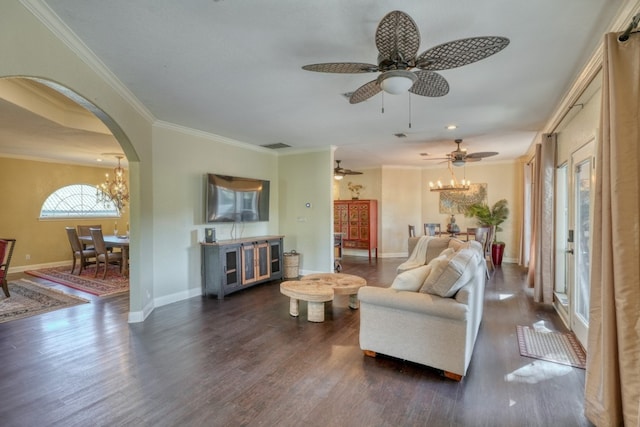 living room featuring arched walkways, wood finished floors, and crown molding