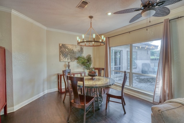 606 Free Rein, Horseshoe Bay, TX 78657 - dining room featuring crown molding, dark wood-style floors, baseboards, a chandelier, and ceiling fan