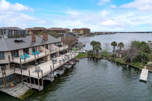 property view of water featuring a boat dock