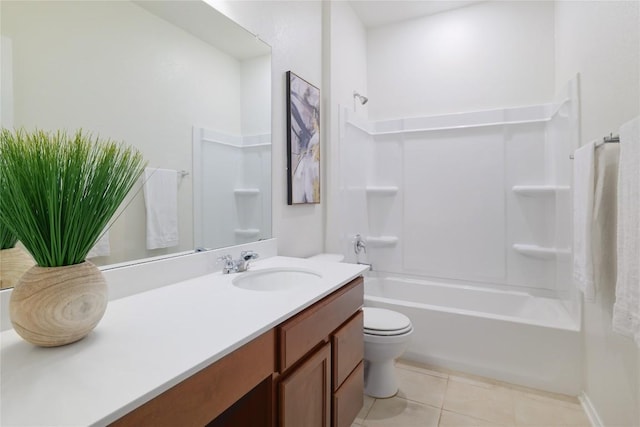 bathroom featuring tile patterned flooring, shower / bath combination, vanity, and toilet