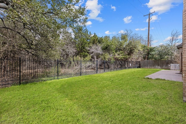 view of yard with a patio area and fence