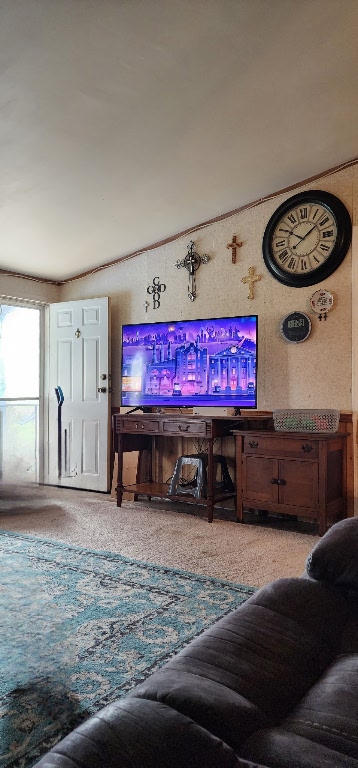 living area with lofted ceiling