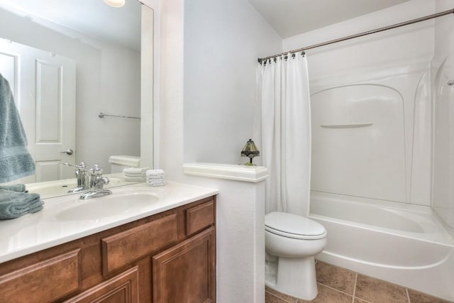 full bathroom featuring shower / bath combination with curtain, vanity, toilet, and tile patterned floors