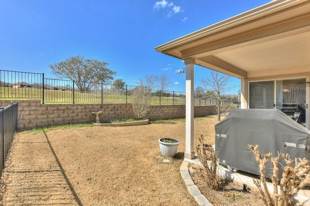 view of yard with a fenced backyard