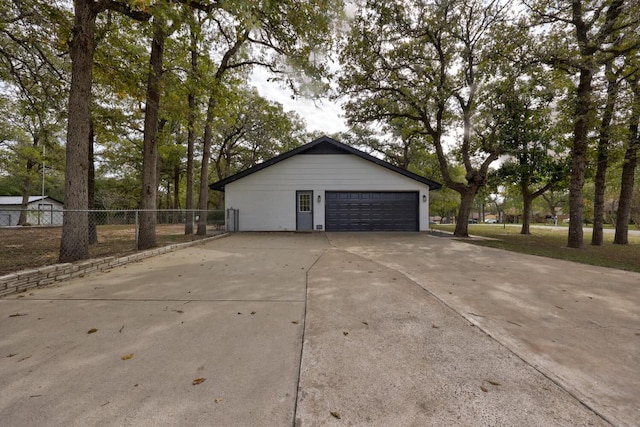 detached garage with fence