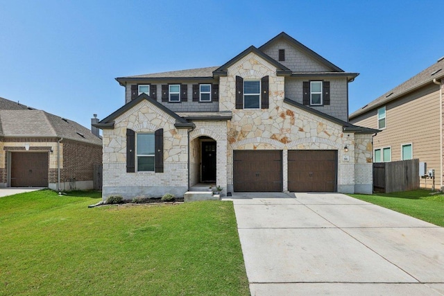 view of front of home with a garage, concrete driveway, a front lawn, and fence