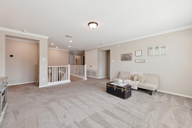 living area featuring carpet flooring, visible vents, crown molding, and an upstairs landing