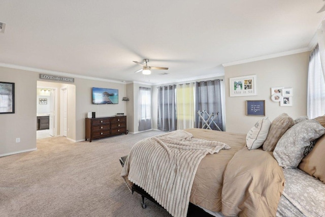 bedroom with crown molding, baseboards, visible vents, and light colored carpet