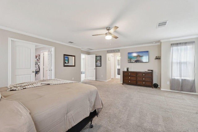 carpeted bedroom featuring ornamental molding, visible vents, and baseboards