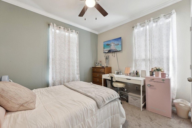 bedroom with light carpet, ornamental molding, and a ceiling fan