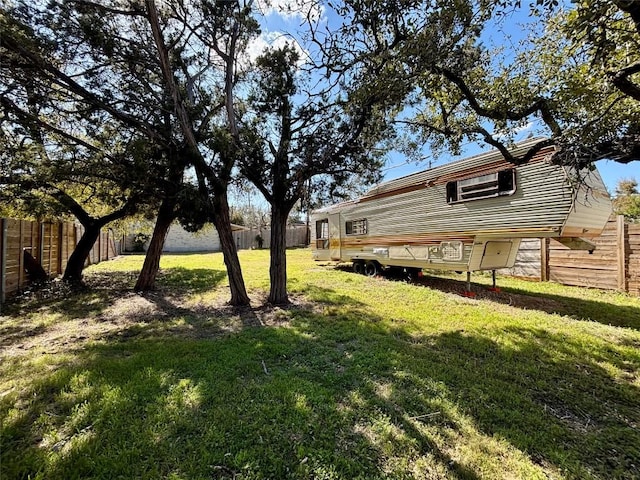 view of yard featuring a fenced backyard