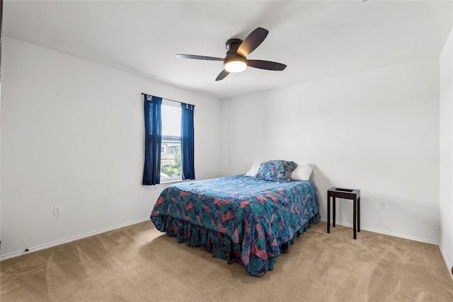 bedroom with carpet flooring and ceiling fan