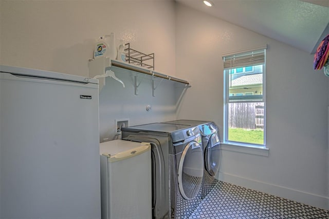 laundry room with washer and dryer, laundry area, baseboards, and recessed lighting