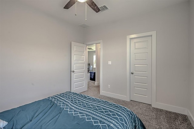 bedroom with a ceiling fan, carpet, visible vents, and baseboards