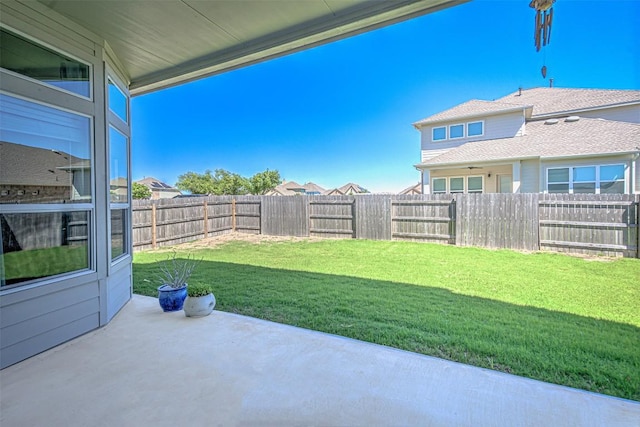 view of yard with a fenced backyard and a patio