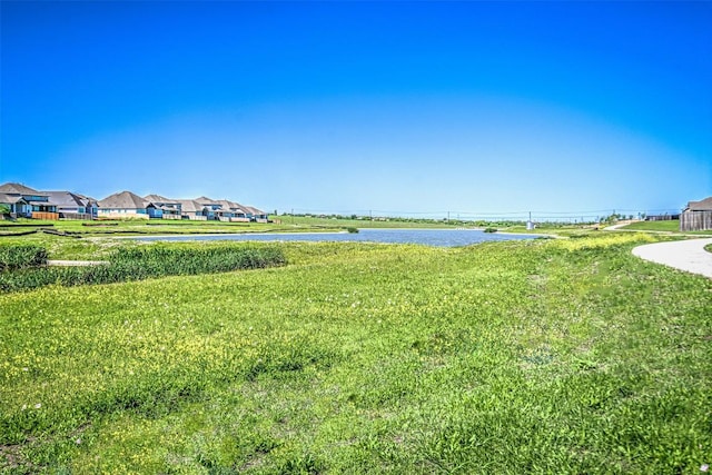 exterior space with a water view and a residential view