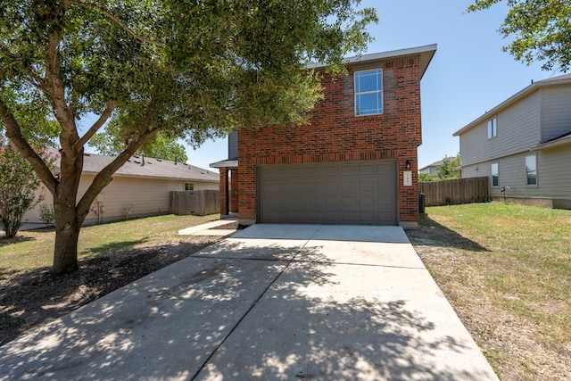 traditional home featuring brick siding, a front lawn, and fence