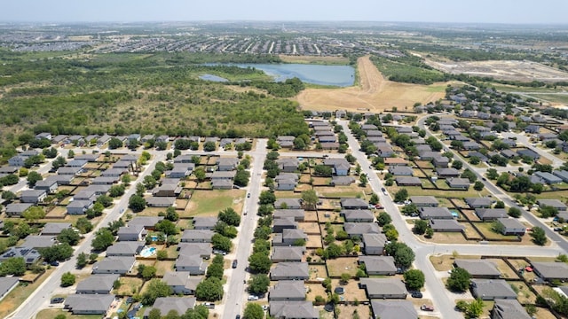 aerial view featuring a water view and a residential view