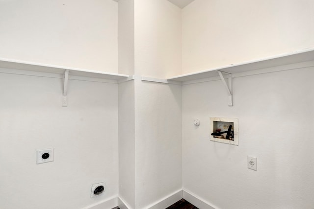 washroom featuring gas dryer hookup, hookup for an electric dryer, laundry area, washer hookup, and baseboards