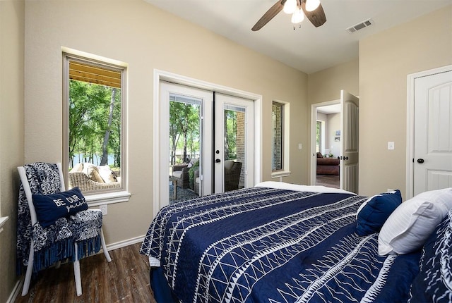 bedroom with baseboards, visible vents, wood finished floors, access to exterior, and french doors