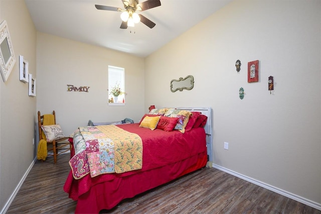 bedroom featuring ceiling fan, wood finished floors, and baseboards