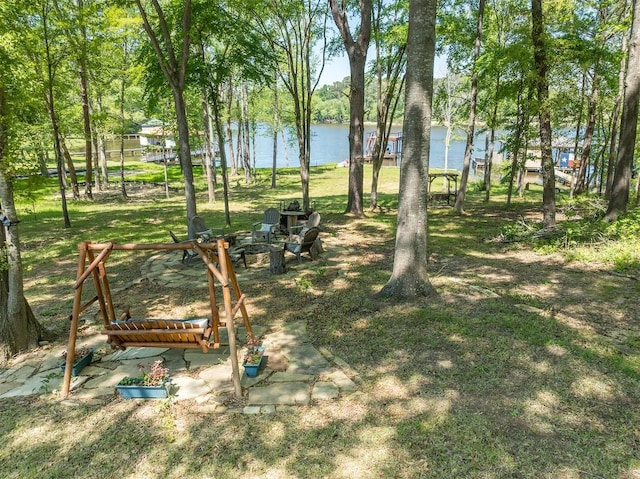 view of yard with a water view