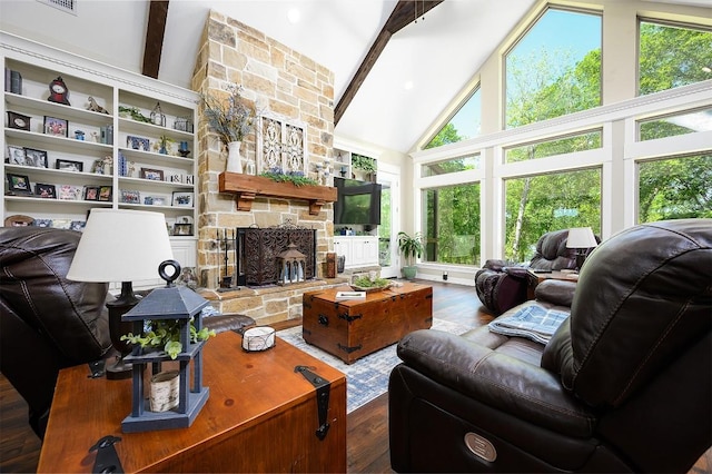 living room with high vaulted ceiling, a stone fireplace, beam ceiling, and wood finished floors