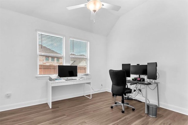 home office with lofted ceiling, wood finished floors, and baseboards